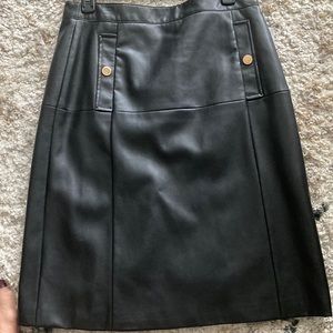 100 percent   faux leather. Size 4 Liz Claiborne skirt.